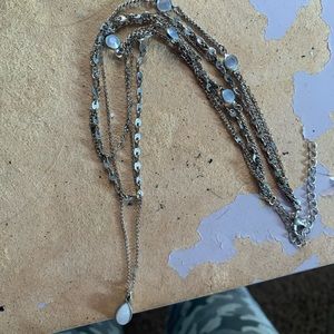 4 connected necklaces filled with opal jewels for $10